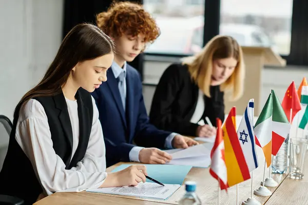 stock image Teenagers participate in a UN Model session, demonstrating their passion for global affairs.