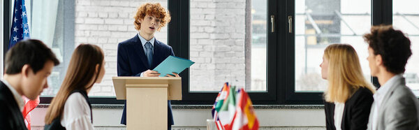 Teenagers participate in a lively discussion at a Model United Nations event.