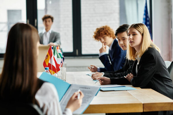 Teens engage in UN Model conference, discussing diplomacy and global relations.