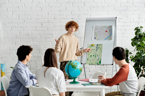 Four teenagers participate in a Model UN simulation, focusing on a map presentation.