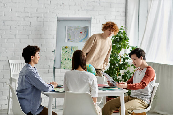 Four teenagers participate in a UN Model simulation, engaging in discussion and debate.