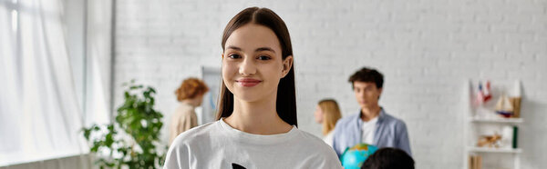 Teenage girl smiles as she takes part in a UN Model simulation.