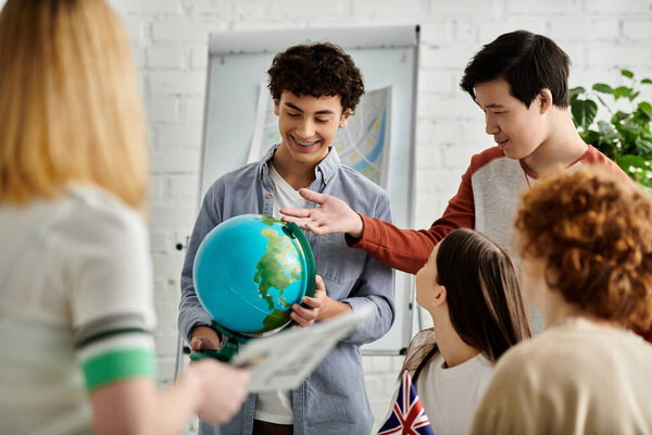 A group of teenagers gather around a globe during a Model UN conference.