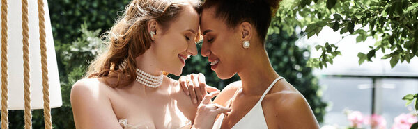 A loving lesbian couple shares a tender moment on their wedding day.