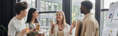 Four colleagues relax during their workday, enjoying coffee and conversation. clipart