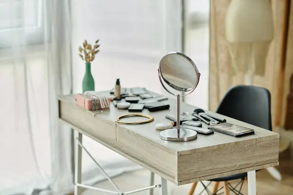 Stock image A makeup table with a mirror, brushes, and cosmetics, set against a bright window.