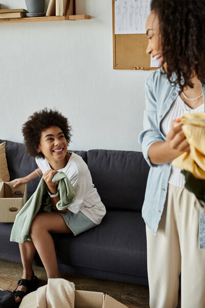 A creative couple transforms their clothes into something new together.