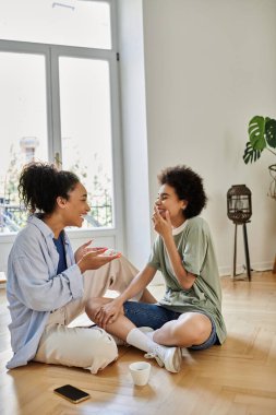 Laughter and warmth fill the air as a couple enjoys each other's company. clipart