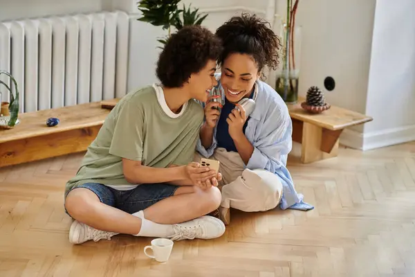 stock image Loving couple shares laughter and joy in their cozy home.