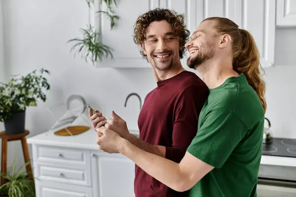 stock image A loving couple shares a tender moment while cooking together.