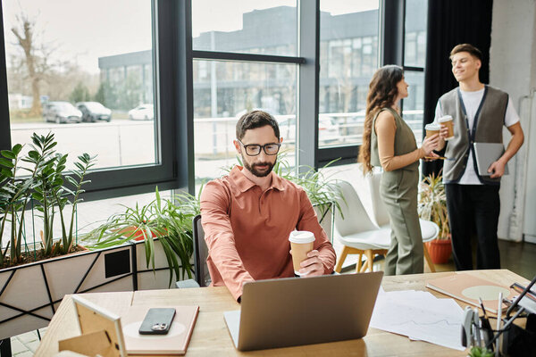 Colleagues engage in heartfelt discussions in modern office.