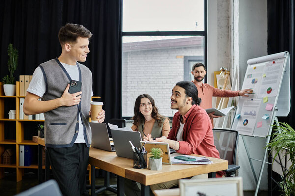 Colleagues working together in modern office.