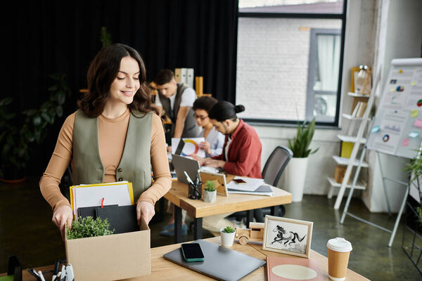 Woman during a challenging layoff process, colleagues on backdrop.