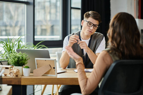 Two colleagues discuss important matters amidst uncertain times.