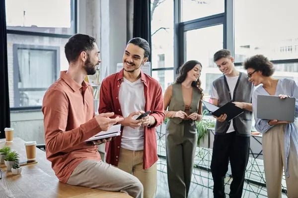 stock image Professionals interact amicably amidst a challenging time.