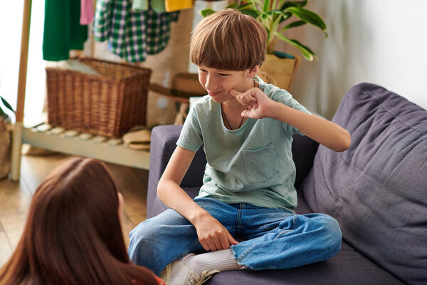 A mother engages happily with her son, fostering communication and connection.