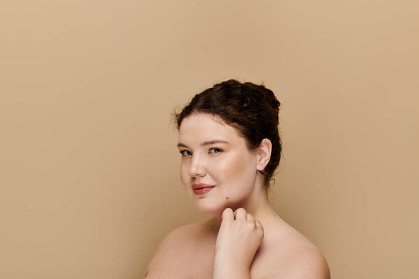 A beautiful plus size woman radiates confidence while showcasing her elegance in a warm setting.