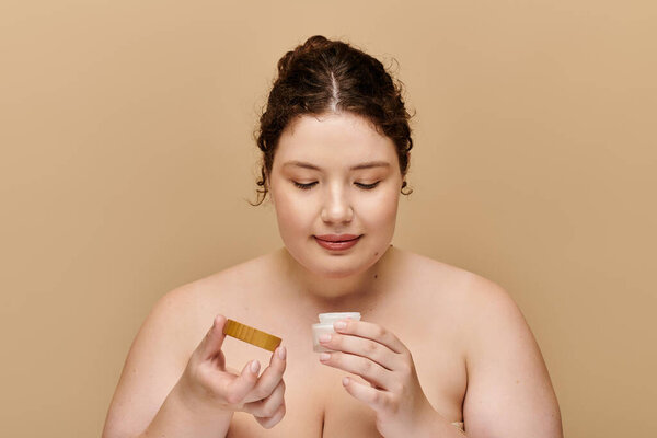 A graceful woman examines her skincare products, embracing self care with serenity and joy.