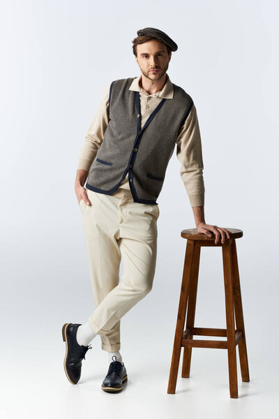 A fashionable individual stands confidently, showcasing a chic ensemble with flair and elegance.