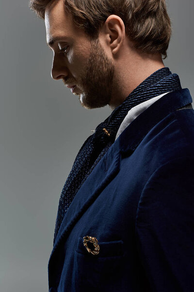 A handsome man dressed in dandy fashion showcases his style with a thoughtful expression.