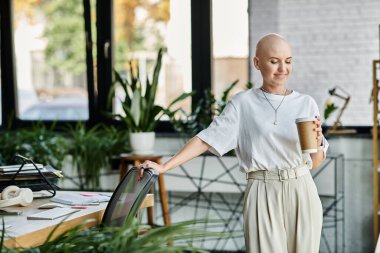 A young bald woman in elegant attire sips coffee, surrounded by lush plants and modern decor. clipart