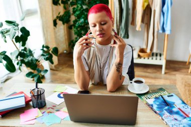 The young woman sits at her desk, lost in thought amid colorful papers and a cozy vibe. clipart