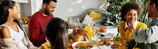 Живое собрание друзей, наслаждающихся праздничной трапезой, наполненной радостью и общением.