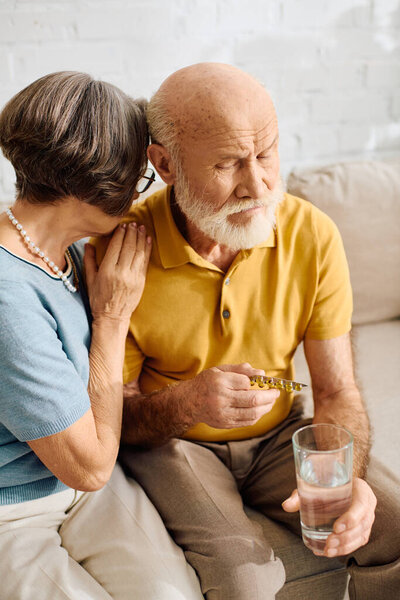 A loving wife comforts her husband as they navigate diabetes together at home.