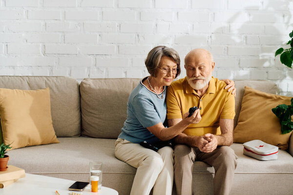 A loving wife assists her husband in managing diabetes, showcasing their strong bond at home.