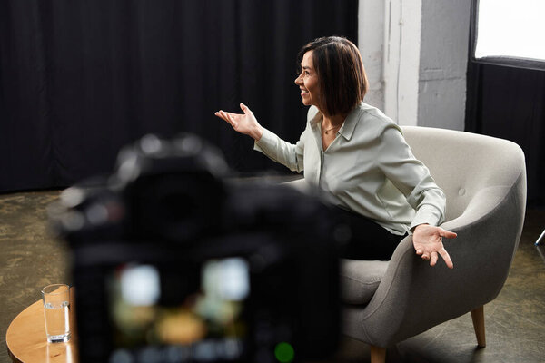 A journalist engages thoughtfully with a specialist, capturing an enlightening discussion on current topics.