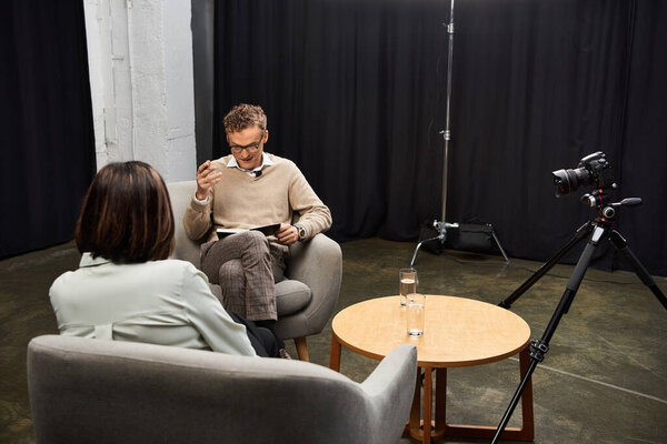 A journalist conducts an in-depth conversation with a woman specialist, sharing insights and expertise.