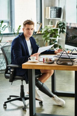 A young and talented businessman demonstrates his skills in a contemporary office, inspiring workplace inclusion. clipart