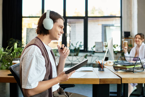 A cheerful young woman enjoys brainstorming with her attentive friend in an inviting office.