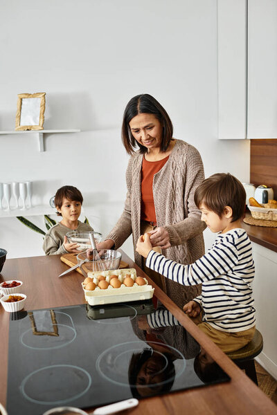 A grandmother happily teaches her grandsons to bake festive goodies in a warm winter kitchen.