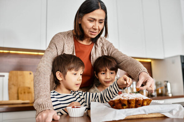 An Asian family enjoys preparing festive baked goods in their modern kitchen, celebrating the holiday spirit.