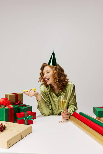 The young woman savors the moment, joyfully posing cheerfully surrounded by colorful decorations.