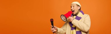 A young man with tattoos enthusiastically addresses a crowd, using a megaphone. clipart