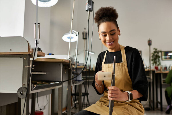 A skilled woman lovingly creates beautiful jewelry, showcasing her artistry and talent.