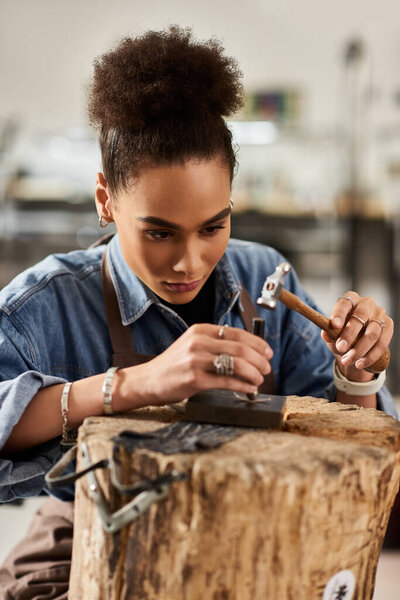 A skilled artisan carefully crafts stunning jewels using traditional techniques and tools.