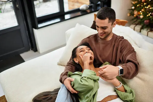 Loving Couple Shares Joyful Moments Modern Living Room Adorned Christmas — Stock Photo, Image