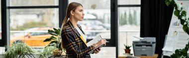 Young businesswoman in a checkered blazer focuses on her notes, embodying modern professionalism, banner clipart