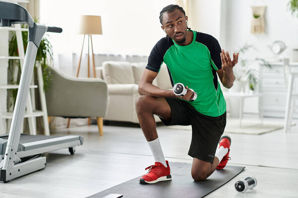In a cozy indoor space, a young african american man exercises while balancing work and fitness.