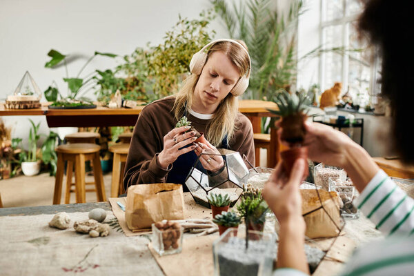 Participants engage in a fun succulents workshop, cultivating plants and friendships together.