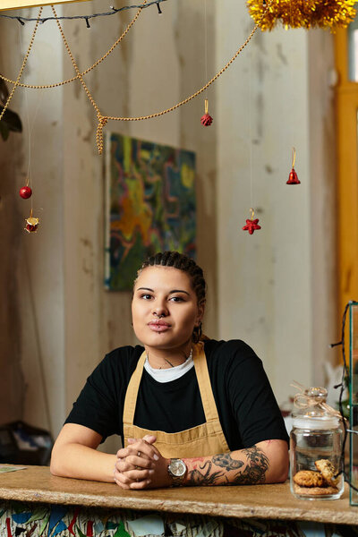 A young woman with a beautiful personality sits contentedly at a cozy cafe, radiating warmth.