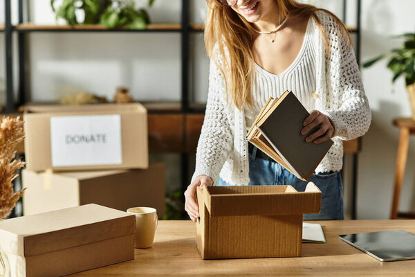 Engaged in an eco-friendly activity, a woman is sorting clothes to donate, promoting sustainability.