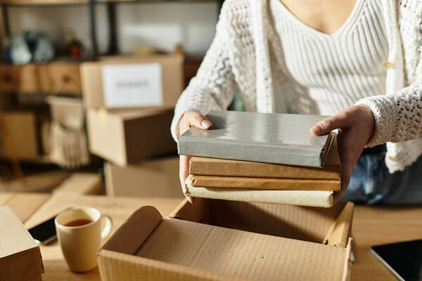 A young woman carefully sorts and donates her clothes, promoting a sustainable lifestyle at home.