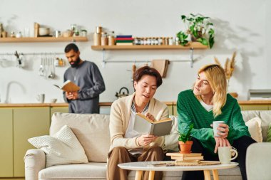 Young men connect over books in a cozy, stylish space filled with warmth and friendship. clipart