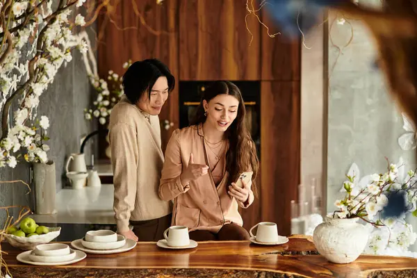 Neşeli bir ortamda, bir çift sevinçle yaklaşan düğün kutlamalarını planlar..