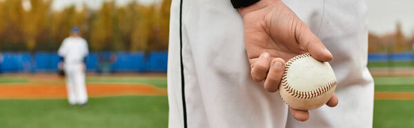 Players compete in an energetic baseball game, banner