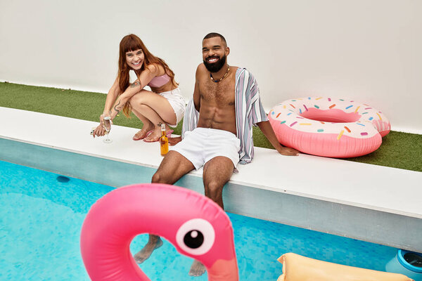 Young friends enjoy laughter and drinks, bonding at a lively pool party filled with energy.